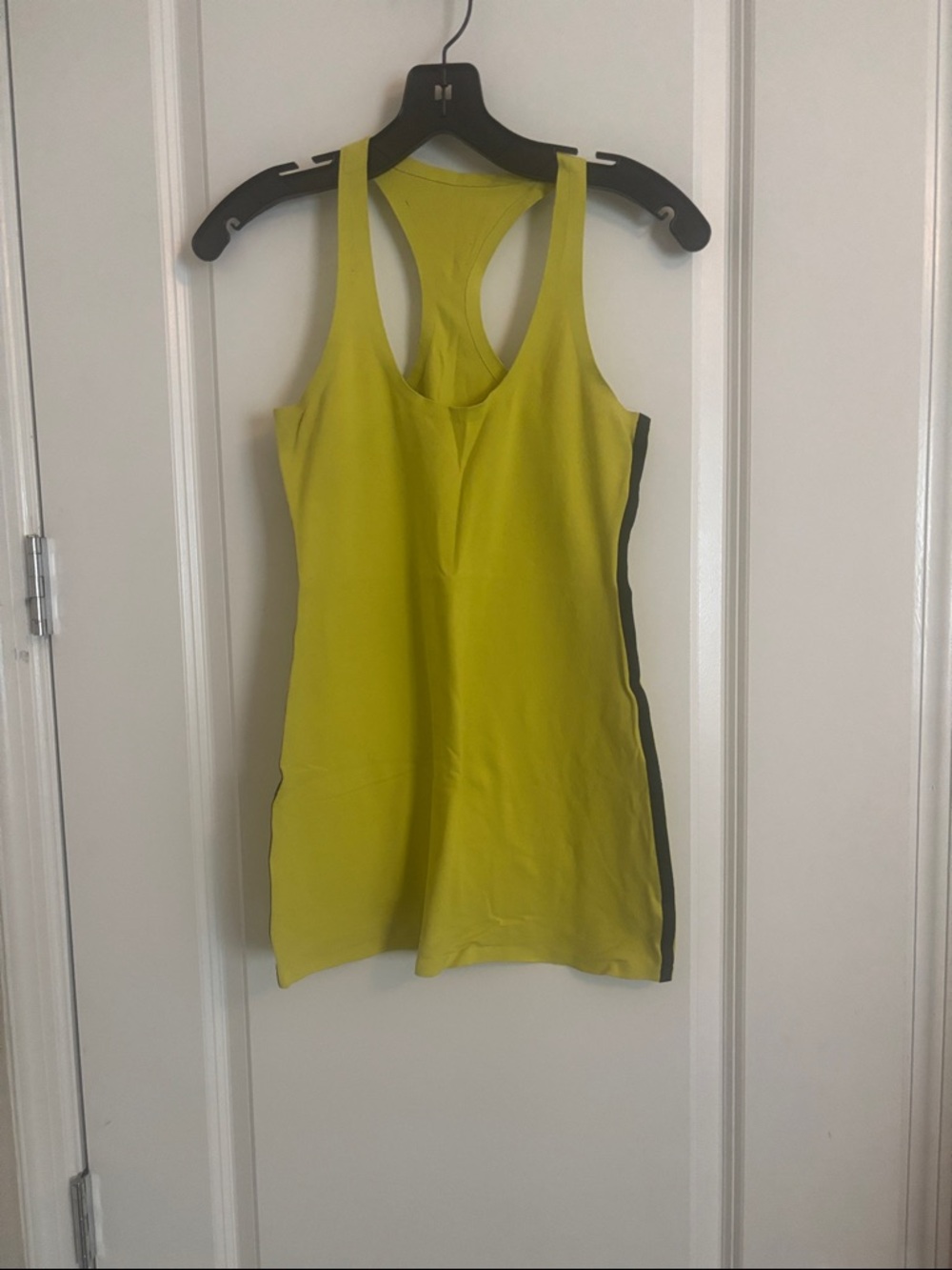 lululemon athletica Neon Yellow Racerback Tank with Black Side Panel.